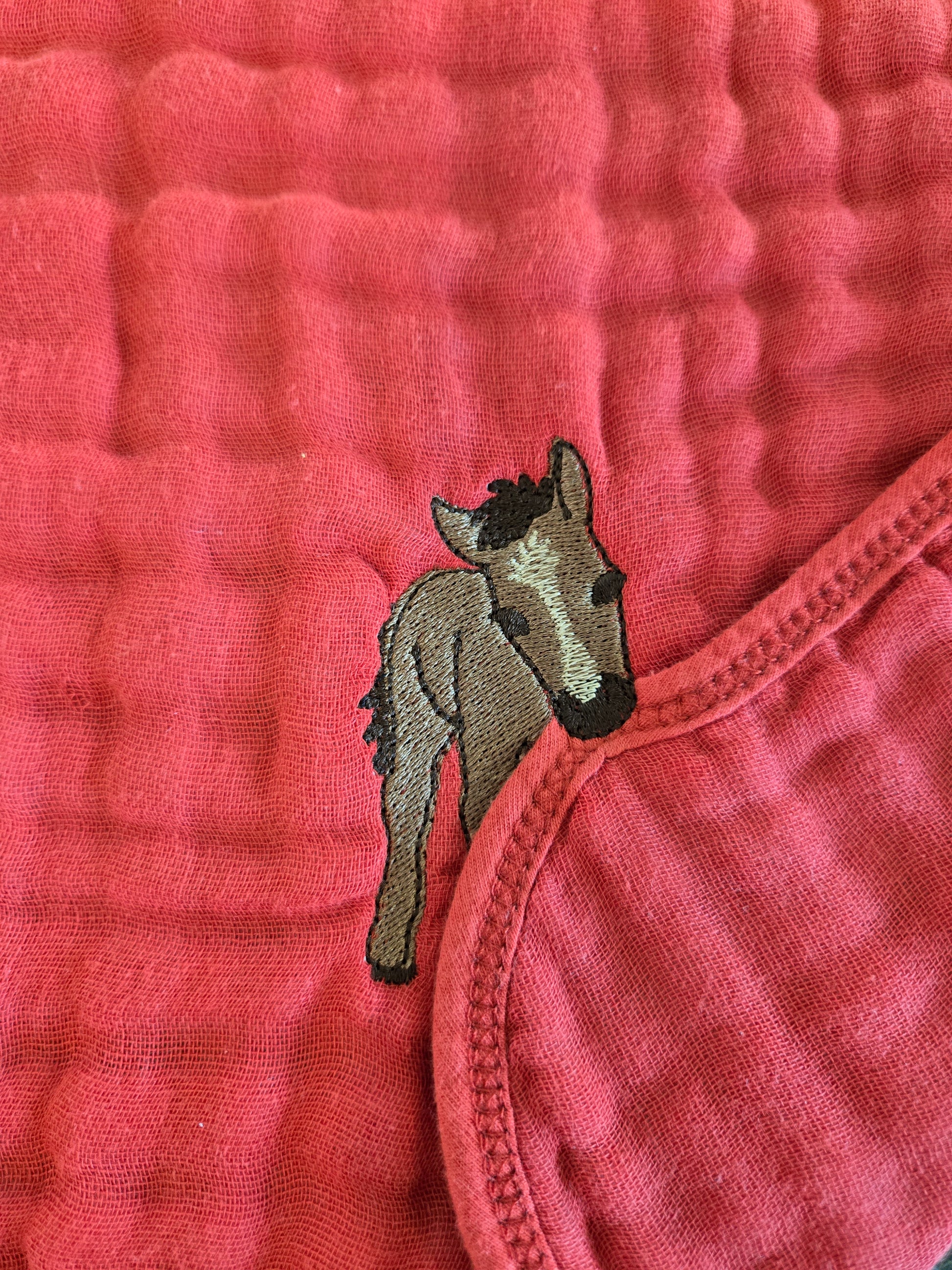 Cheeky baby horse foal pet thief embroidery design on Red tea towel NZ