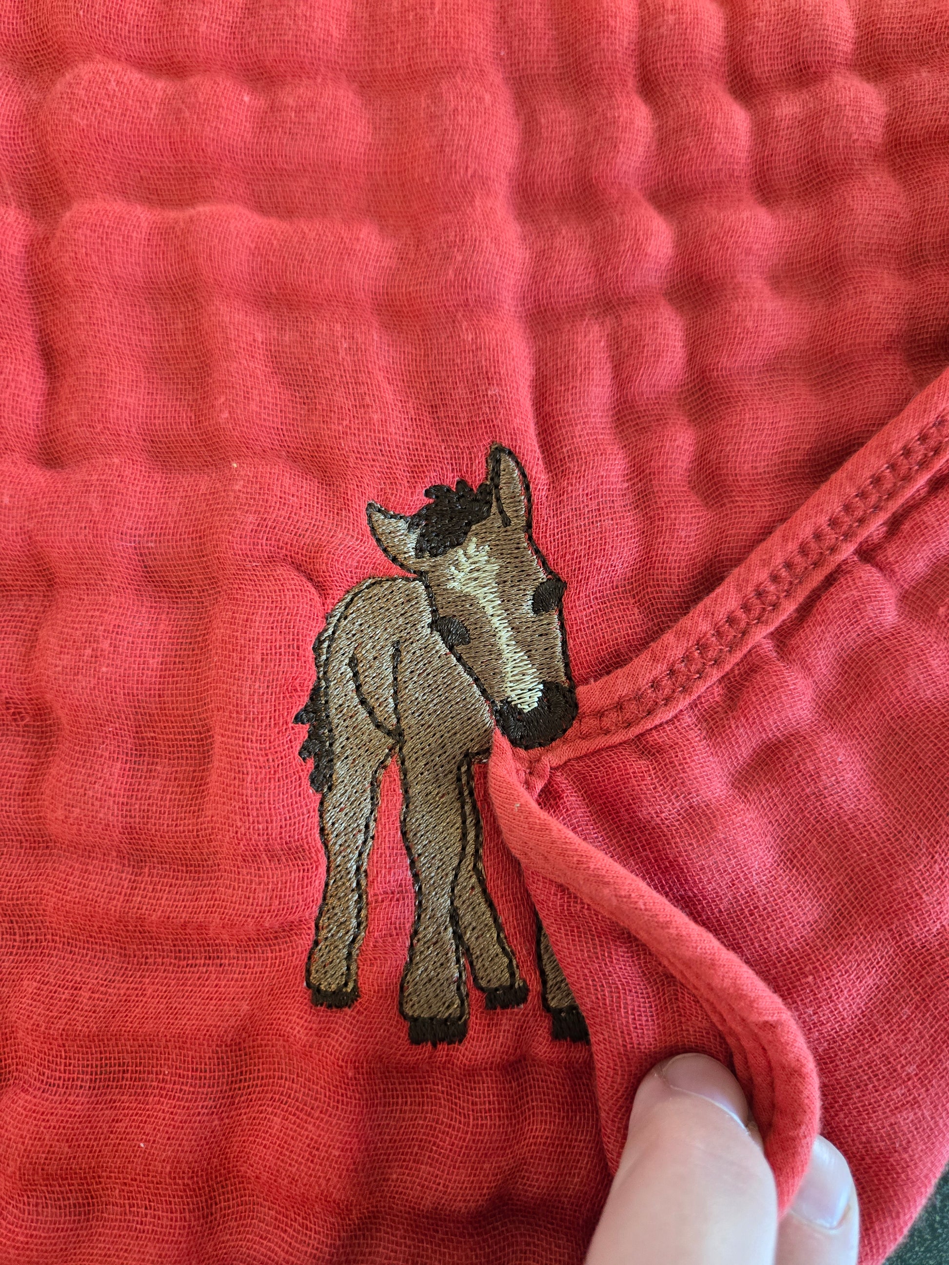 Cheeky baby horse foal pet thief embroidery design on Red tea towel NZ