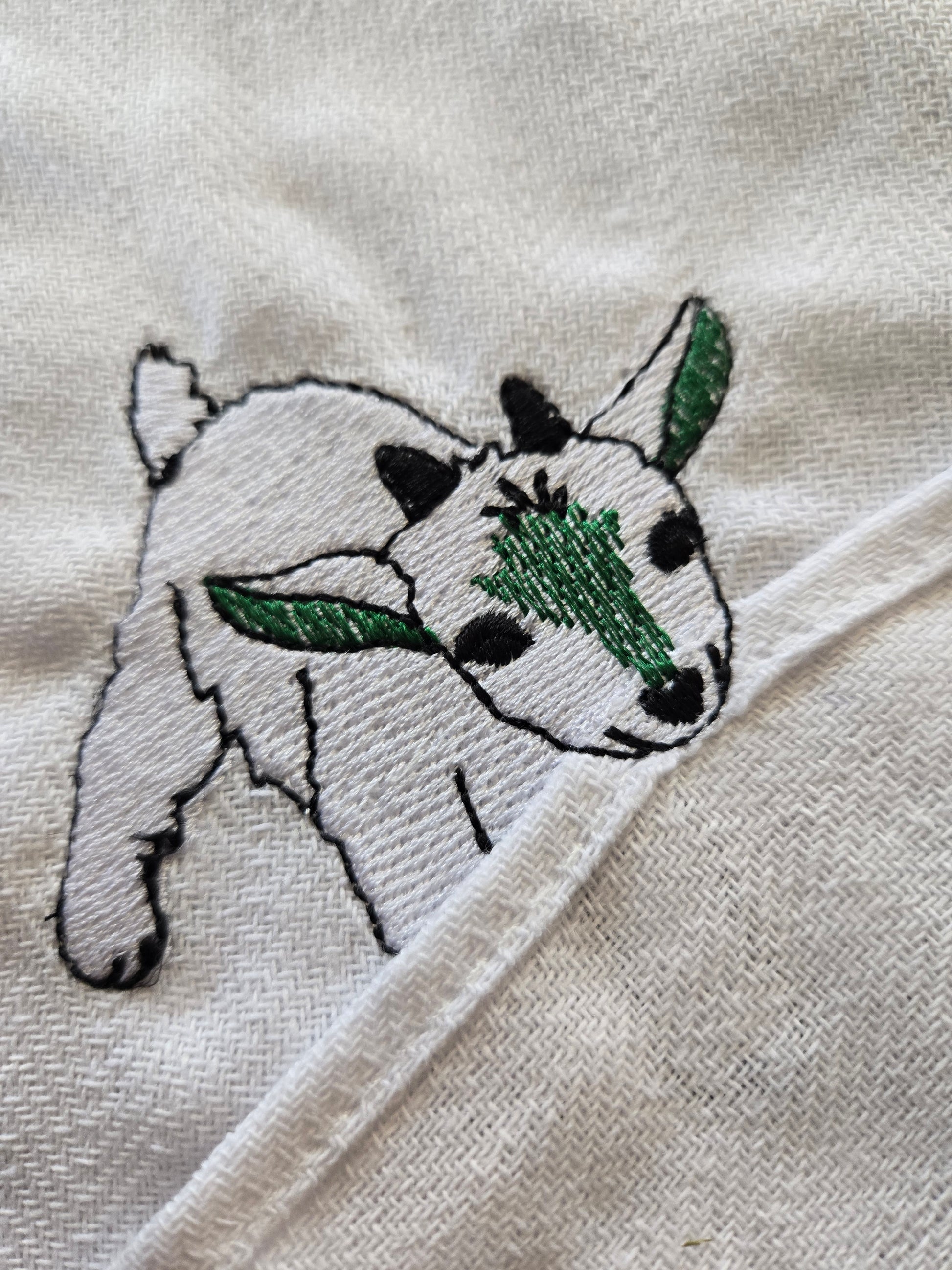 Cheeky little kid goat pet thief embroidery design on white cotton striped tea towel NZ