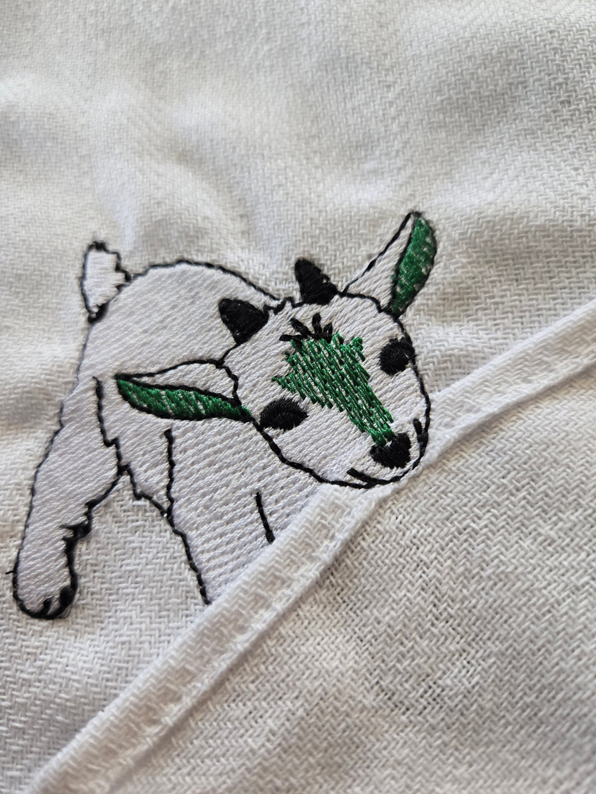 Cheeky little kid goat pet thief embroidery design on white cotton striped tea towel NZ