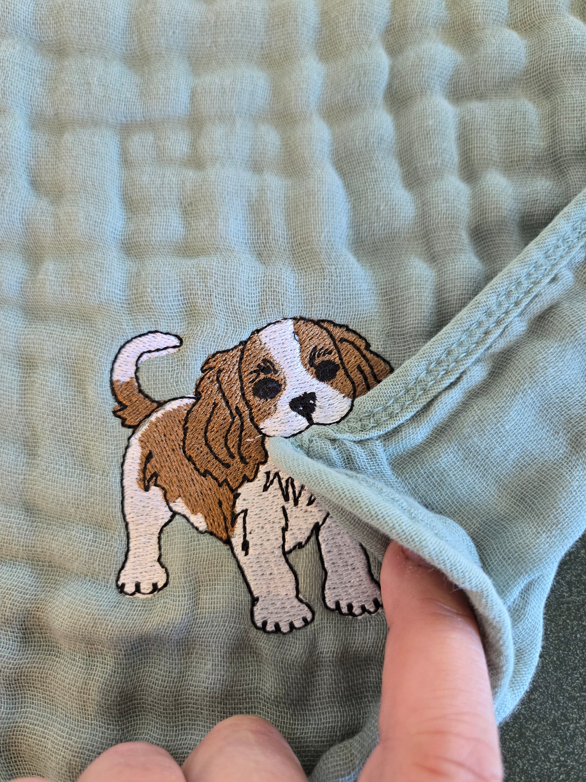 Cute Cavalier King Charles puppy dog pet thief embroidery design on Sage tea towel NZ